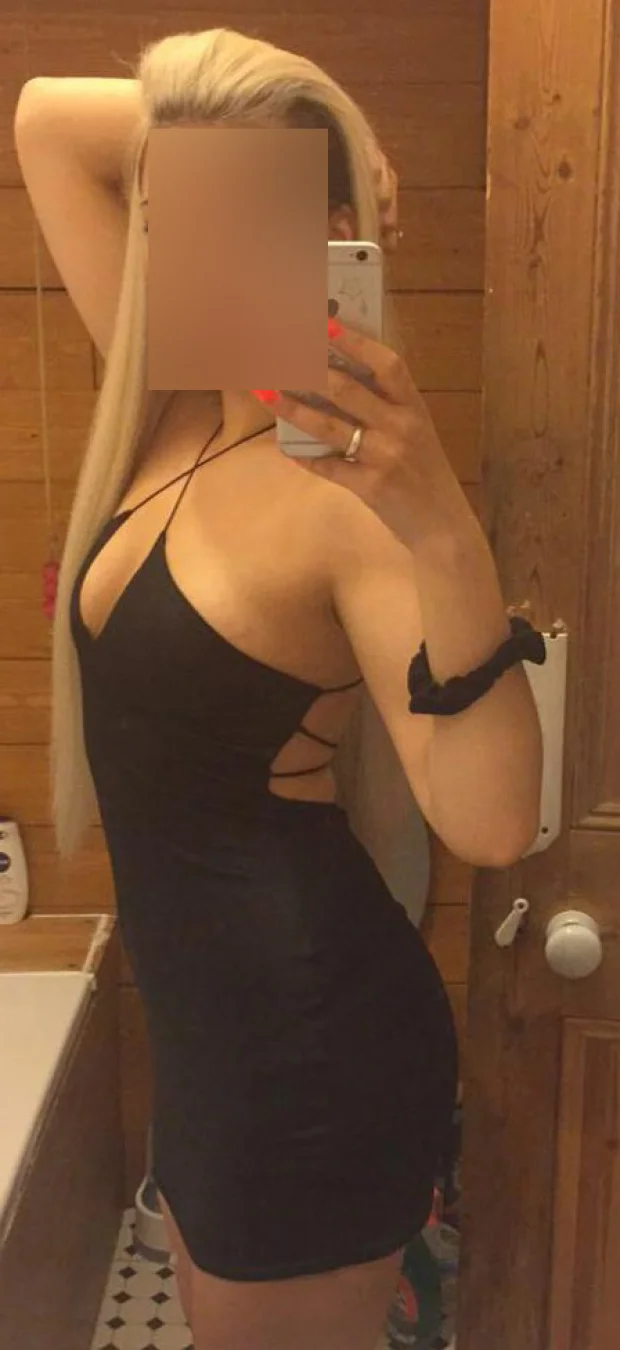 Sexy Linda taking a selfie in sultry black dress